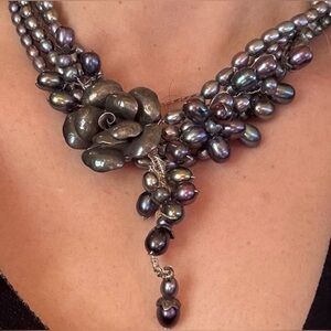 Elegant Pearl Necklace with Floral Accent